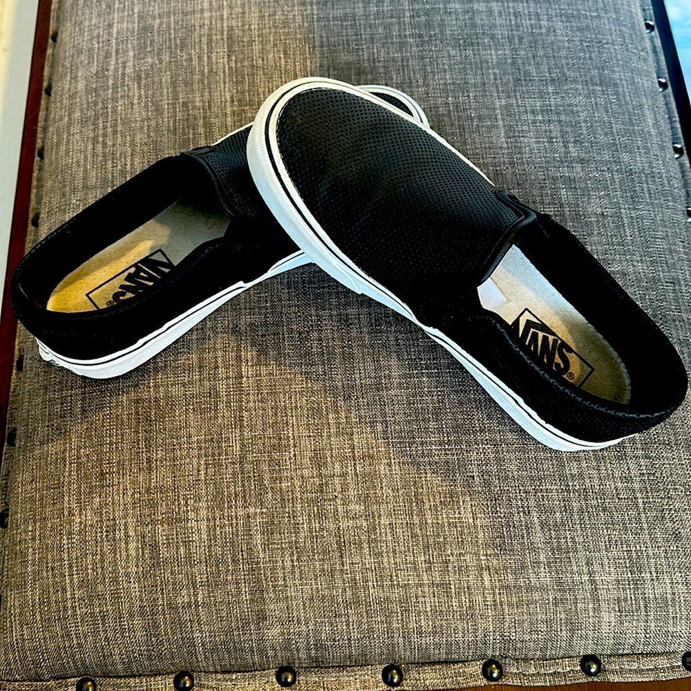 Women’s black leather vans .   Lightly worn. Size 6